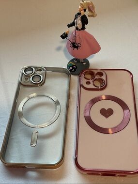 Clear & Pink iPhone 15 Cases with Camera Protection. Includes both.